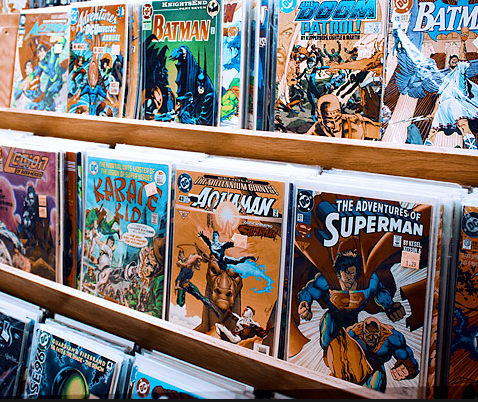 a book shelf showing different types of comic books