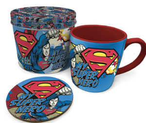 a cup, plate and tumblers showing superman presents 