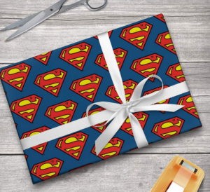 a scissors and a present showing Superman Wrapping Ideas